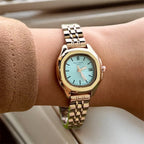 PTK PHILPP DAMA DORADO FONDO AZUL