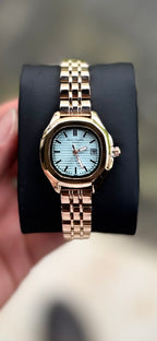 PTK PHILPP DAMA DORADO FONDO AZUL